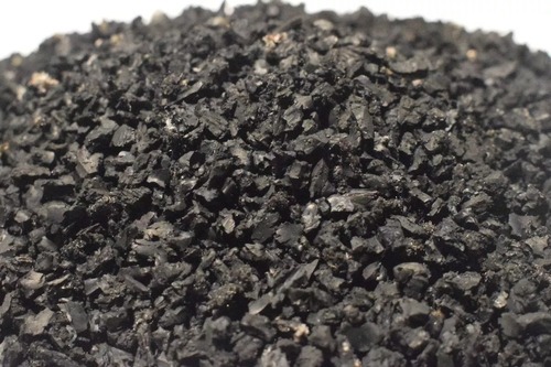 Caucho Molido Negro para Canchas de Fútbol